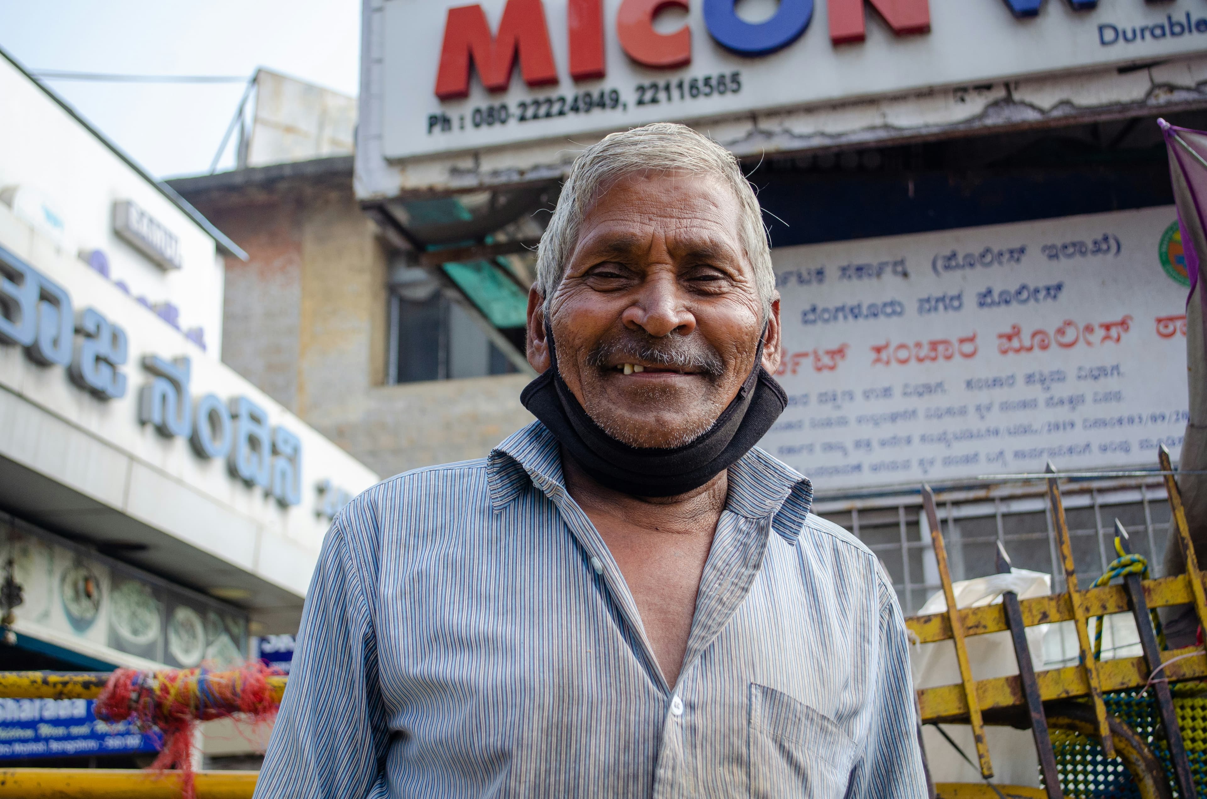 a man standing in front of a store