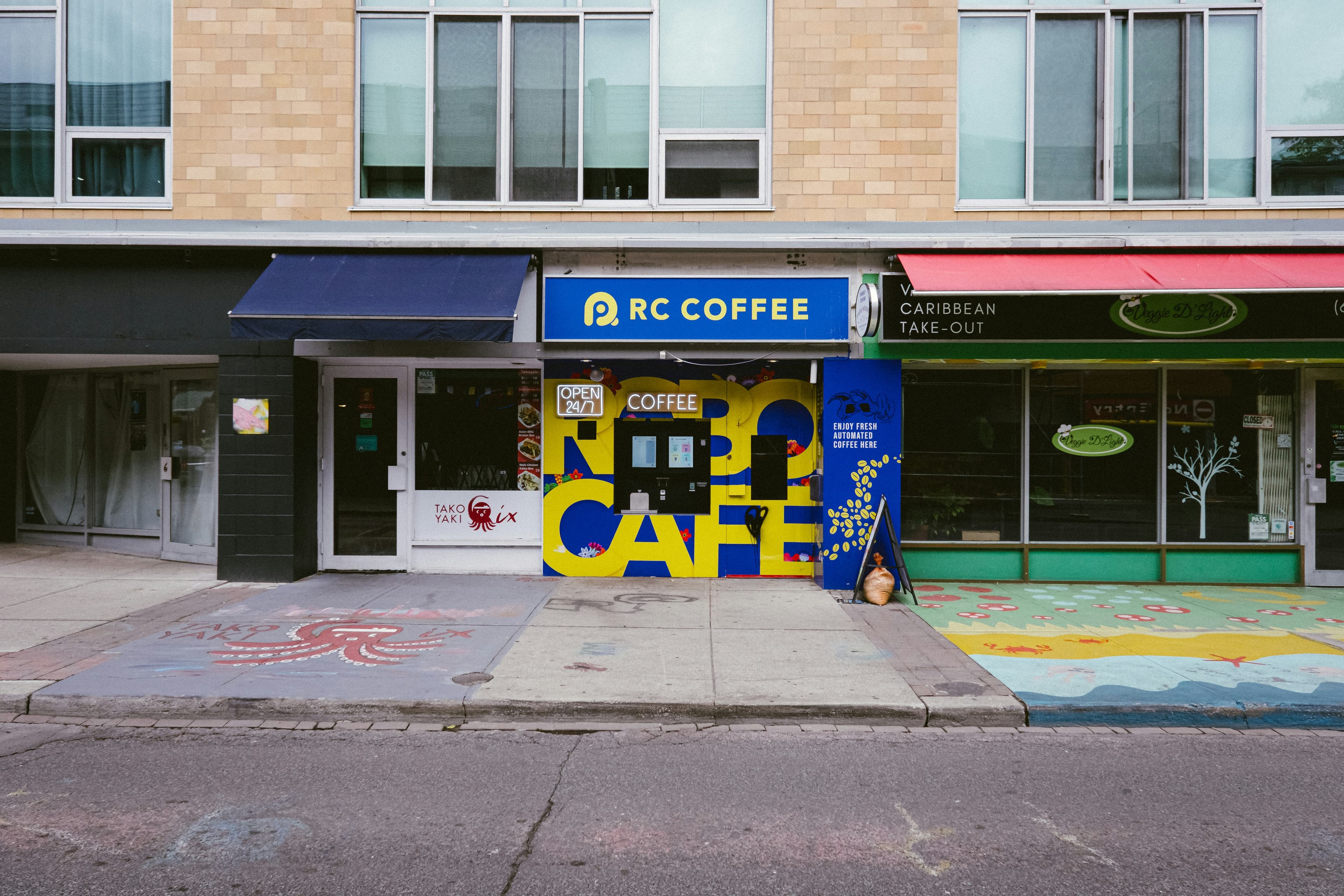 A coffee shop on the corner of a street