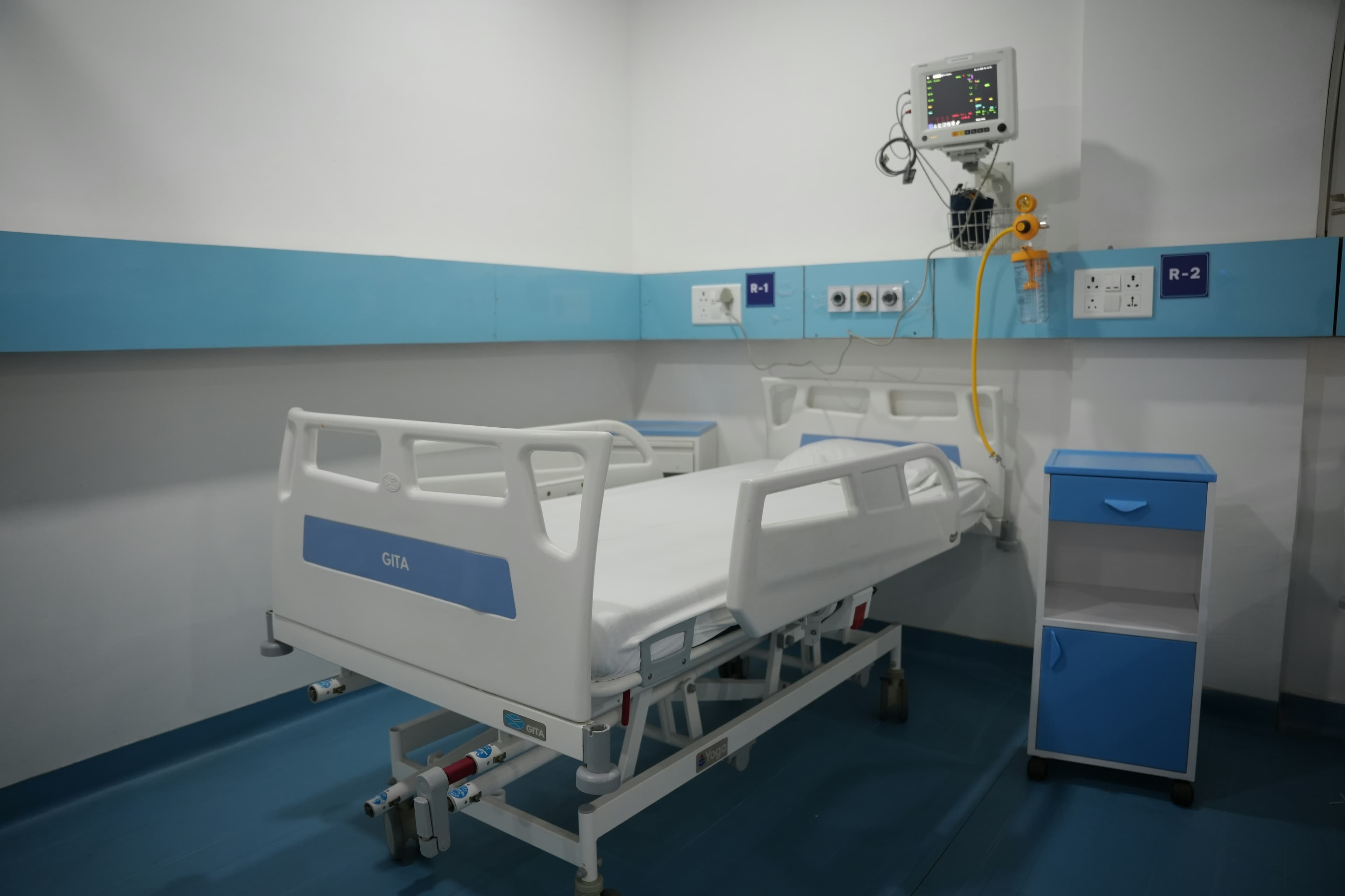 A modern hospital room with an adjustable bed.